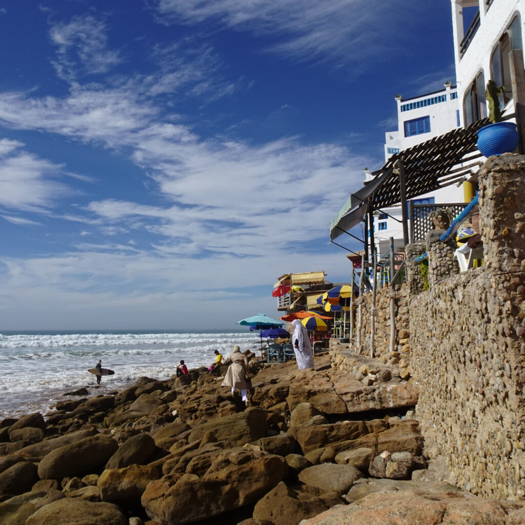 Taghazout Morocco view of the beach front with cafes and surfers